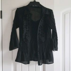 Black ruffled blouse